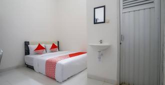 Wisma Hiro Pertiwi - Palembang - Bedroom