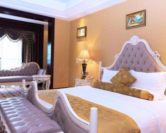 Taishan Bojue Hotel - Jiangmen - Slaapkamer