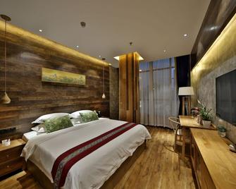 Yinqi Xinsu Hotel - Nan-čchang - Ložnice