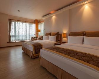 Crossing The Rainbow Bridge B&B - Xincheng Township - Habitación