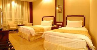 Inner Mongolia Huachen Hotel - Huhhot - Yatak Odası