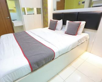 Hotel O Ciputat Near Apartment Green Lake View Ciputat - Pamulang - Bedroom
