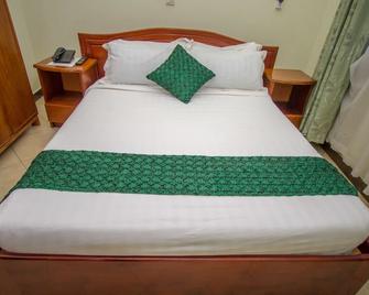 Jevine Hotel - Kampala - Schlafzimmer