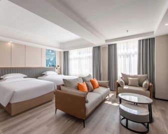 Echarm Hotel Zhanjiang Haibin Avenue Wanda Plaza - Zhanjiang - Habitación