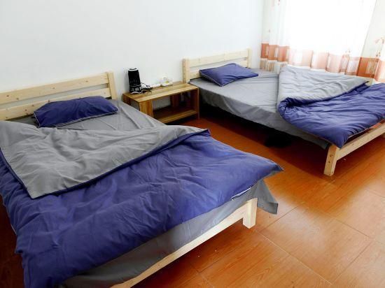 Wuyishan Blue Sky Youth Hostel - شانغراو - غرفة نوم