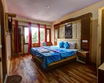 Hotel Solitaire Manali - Manali - Bedroom