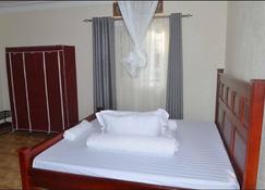 Migingo Suites - Entebbe - Bedroom