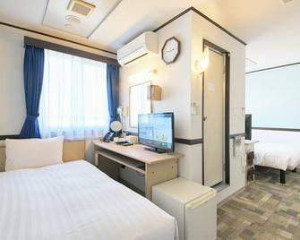 Toyoko Inn Nagoya Marunouchi - נאגויה - חדר שינה