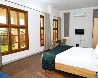 Neer By Monarch Stays - Surathakal - Bedroom