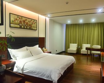 Shengdalou Hotel - Dongfang - Bedroom