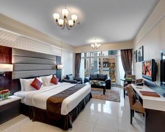 شقق إميريتس جراند الفندقية - دبي - غرفة نوم