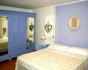 Arcobaleno Bed&Breakfast - Castiglione della Pescaia - Camera da letto