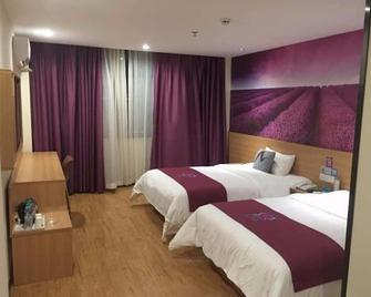 Pai Hotel Zhengzhou Jingsan Road Fortune Plaza - Zhengzhou - Slaapkamer