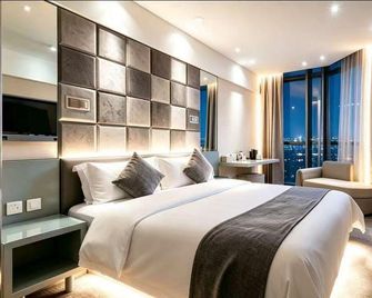 Zsmart Hotelsuzhou Guanqian Street Metro Branch - Suzhou - Schlafzimmer