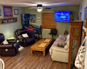 Riverside Cabin B White River is 110 ft away with Riverview from Deck King Bed - Lakeview - Living room