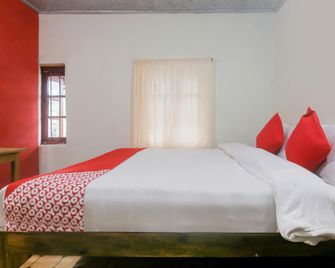 Hotel O Bell's Bigxa Homestay - Cherrapunji - Habitación