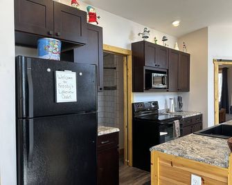 Hot tub - Great views - close to PRNL - private - Christmas - Cocina
