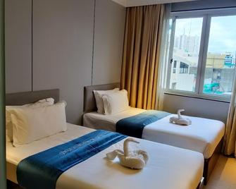 Pristine Hotel - Manilla - Slaapkamer