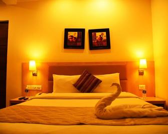 Royal Orchid Suites - Bengaluru - Bedroom