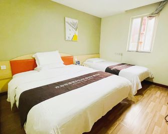 7 Days Inn Nanjing Dachang Walking Street Branch - Nanjing - Bedroom