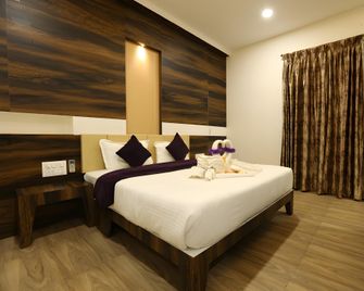 Hotel Milan - Bijapur - Bedroom