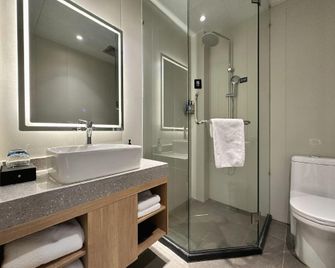 World Smart Hotel (Zibo Huantai County Xinyulou Zhangbei Road) - Zibo - Slaapkamer