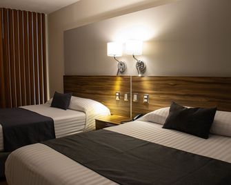 Estanza Hotel & Suites - Morelia - Quarto