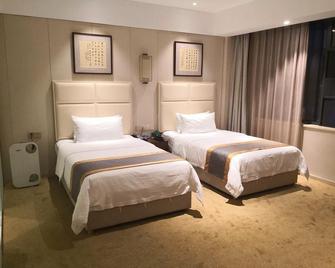 Jinqiao International Hotel - Xianning - Bedroom