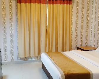 Al Marjan Furnished Apartments - Ajman - Bedroom