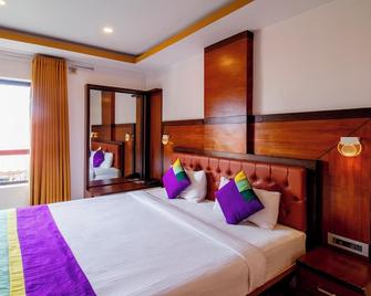 Treebo Premium Palmyra Milford, 2 Km From Alleppey Beach - Аллеппі - Спальня