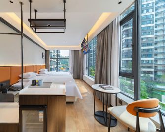 Su Tang Yue Hotel (Nanchong Outlet Plaza Branch) - Nanchong - Camera da letto