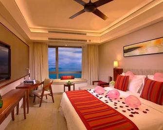 Sanya Seacube Holiday Hotel - Sanya - Slaapkamer