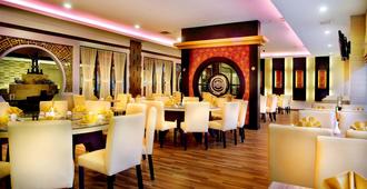 Aston Palembang Hotel & Conference Center - Palimbão - Restaurante