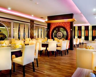 Aston Palembang Hotel & Conference Center - Palimbão - Restaurante