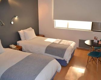 هوتل نيبون - سانتياغو - غرفة نوم