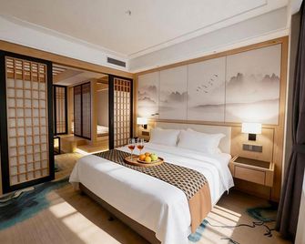 Checheng Mingzhu Hotel - Š-jen - Ložnice
