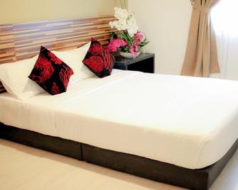 We Hotel - Butterworth - Спальня
