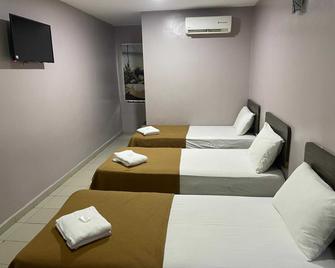 OYO 91119 Hotel D'Lima Inn Langkawi - Kuah - Slaapkamer