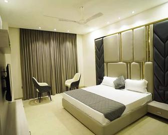 Goroomgo Ovel Hotel (Luxury) Ludhiyana - Ludhiāna - Habitación