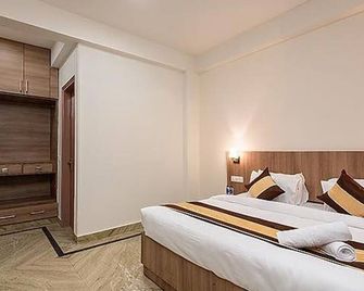 فاب هوتل بلاتينوم إن - مومباي - غرفة نوم