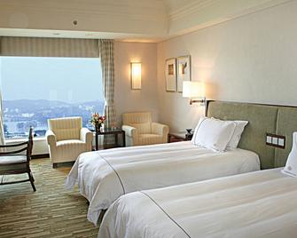 Kande International Hotel Huizhou - Huizhou - Bedroom