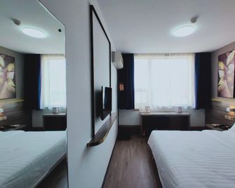 7Days Inn Huanghai First Road - Rizhao - Slaapkamer