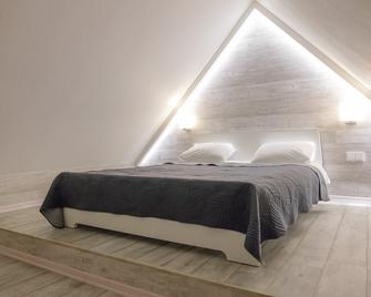 Glarus Hotel - Murmansk - Schlafzimmer