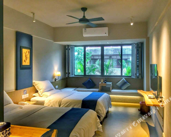 Xishuangbanna Jinghongyun Jintai Resort Hotel - Xishuangbanna - Habitación