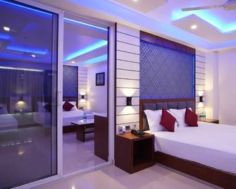 Royal Gitanjali Resorts & Spa - Mandarmani - Schlafzimmer