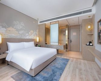 Grand Madison Hotel Wuhan Optical Valley Canglongdao - Wuhan - Makuuhuone