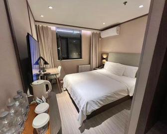 Hanting Hotel Zibo Jinjing Avenue Mixc Bajuju - Zibo - Habitación