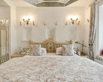 جاجات نيواس بالاس - أودايبور - غرفة نوم