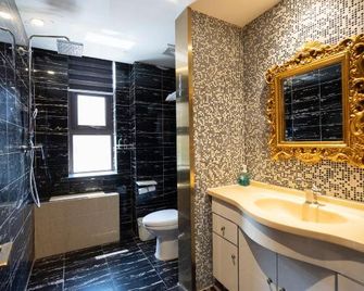 Jtour Inn - Qingdao - Wohnzimmer