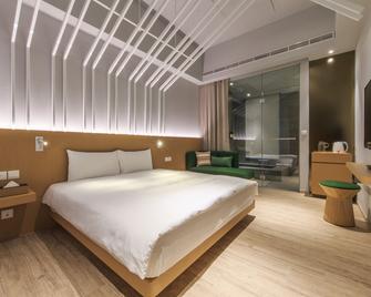 Hotel Pin Jiaoxi - Jiaoxi - Schlafzimmer